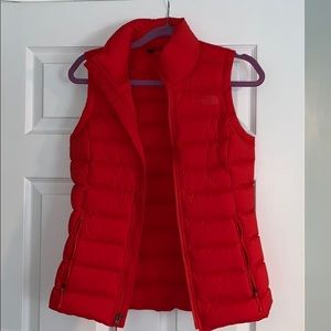 Red North Face puffer vest